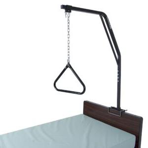 A trapeze bar attached to a hospital bed.